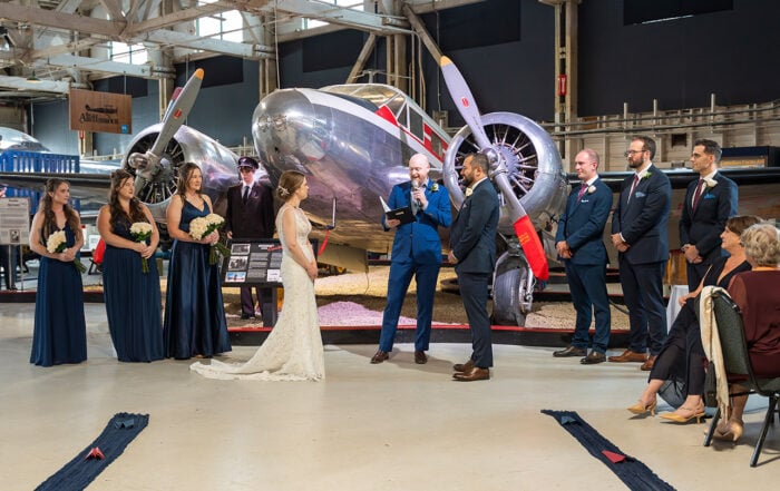 Emma and Braedon’s wedding ceremony inside Alberta Aviation Museum in Edmonton