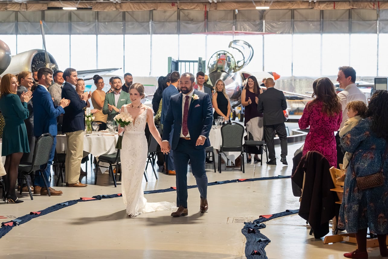Wide ceremony view during an Alberta Aviation Museum wedding in Edmonton