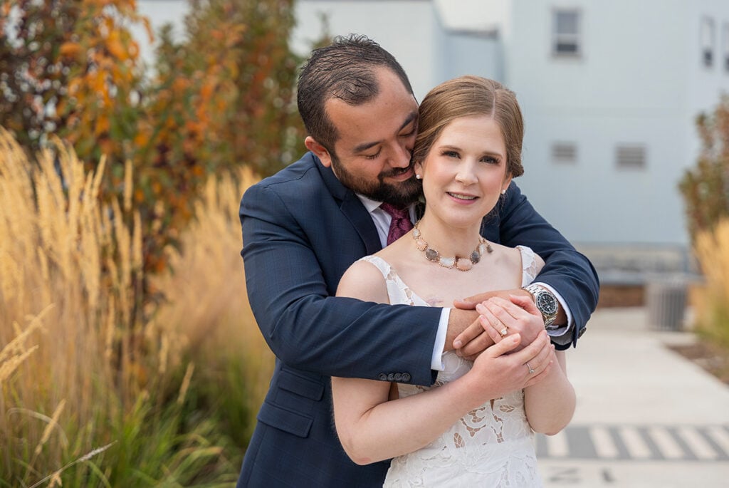 Emma and Braedon sharing a quiet wedding portrait in Edmonton
