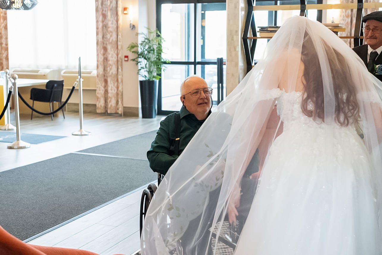 Bride and groom sharing a quiet first look at Sandman Signature Sherwood Park
