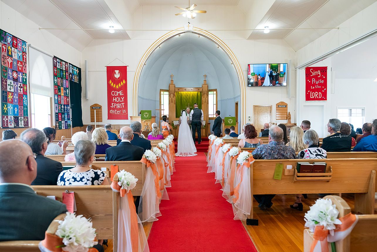 Trudy and Byron’s wedding ceremony inside St. Paul’s Lutheran Church in Rolly View, Leduc County.